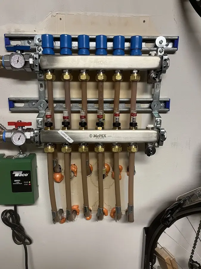 Plumber performing Gas Line Installation at a residential property in New Franklin